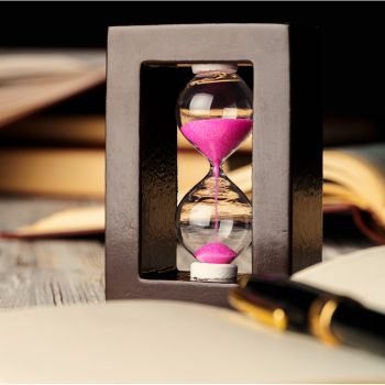 800x800-_0011_sandglass-on-wooden-table-with-opened-book-close-u-2026-01-08-05-54-29-utc